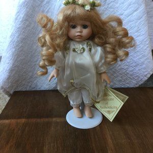 Porcelain doll with Certificate of Authenticity